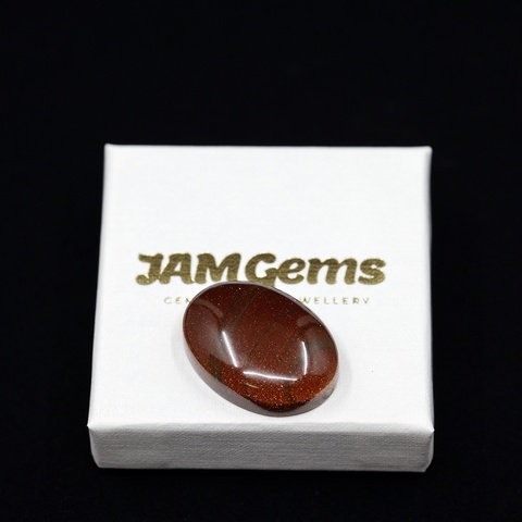 Banded Goldstone Oval Cabochon